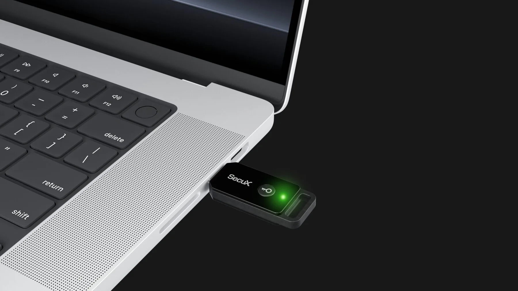 SecuX PUFido Key 2 plugged into a laptop